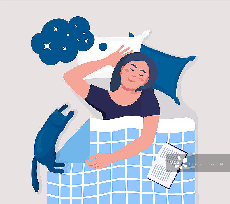 女人晚上带着书和猫睡觉图片素材