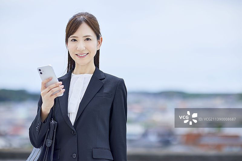 户外日本女商人肖像图片素材