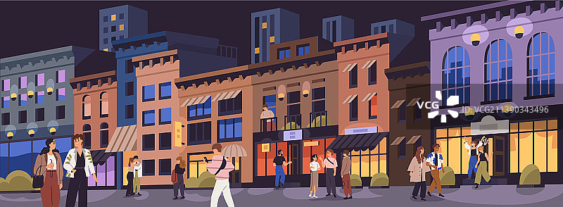 夜间城市街道上行走的人群图片素材