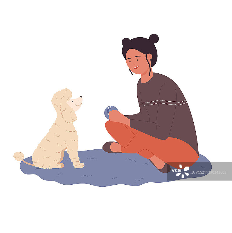 与小狗玩耍交谈的兴奋女孩图片素材