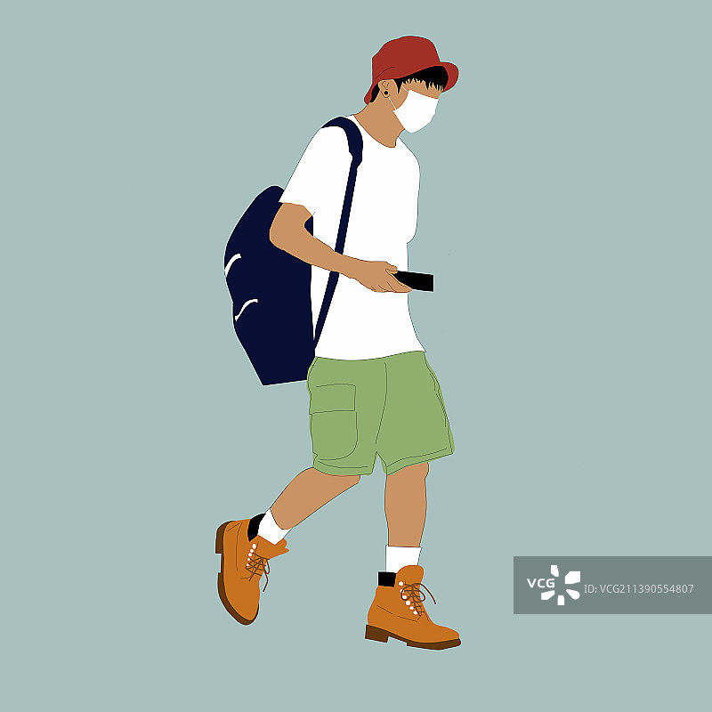 戴红色帽子、穿绿色短裤和棕色鞋子的男人图片素材