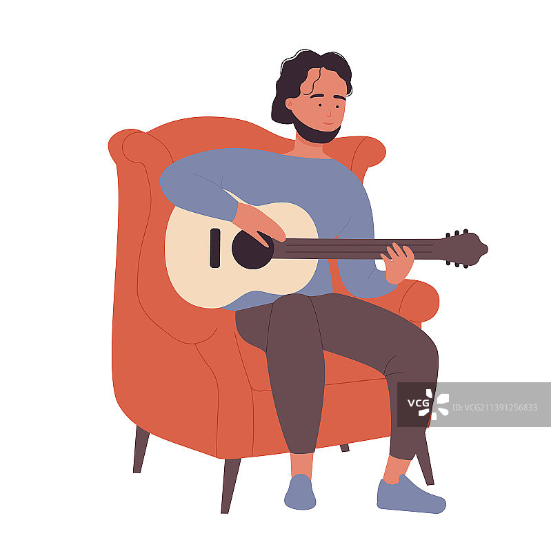 坐在扶手椅上弹吉他的男孩图片素材