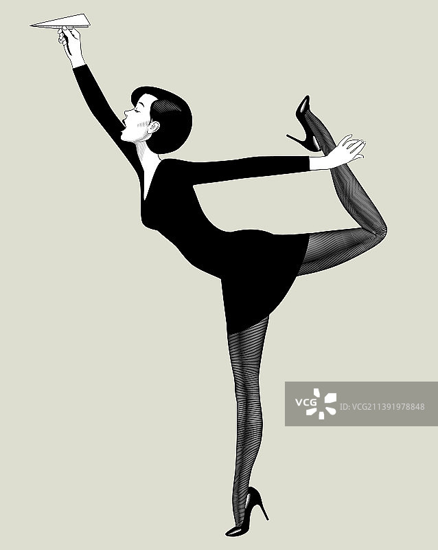 穿着黑色连衣裙的美丽年轻女人图片素材