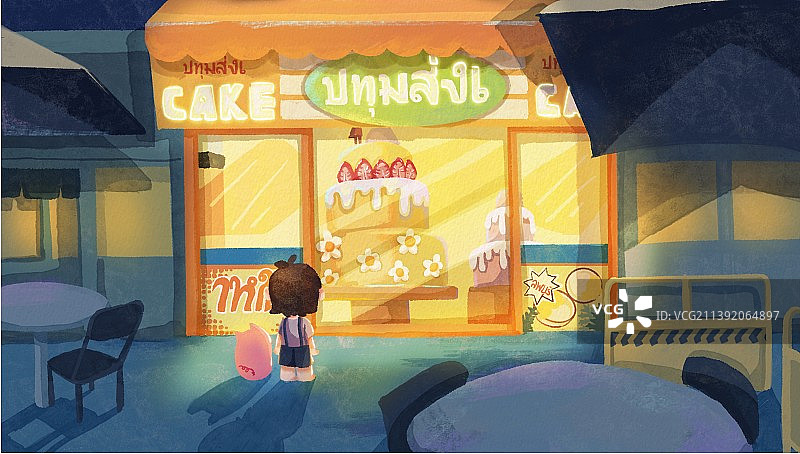 小男孩看着店里的大蛋糕很向往图片素材