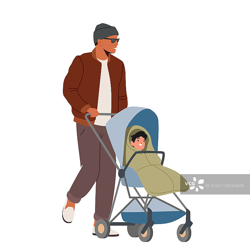 男人推着婴儿车行走图片素材