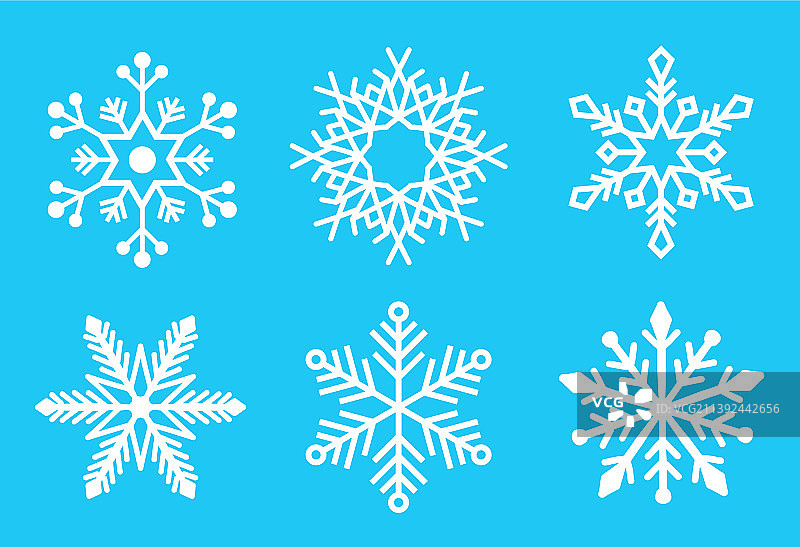 蓝色背景上的简约雪花设计图片素材