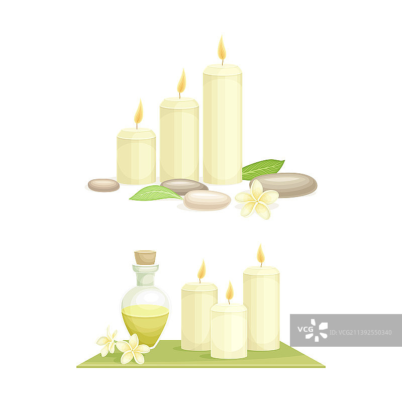 水疗用品套装：精油瓶和燃烧的蜡烛图片素材