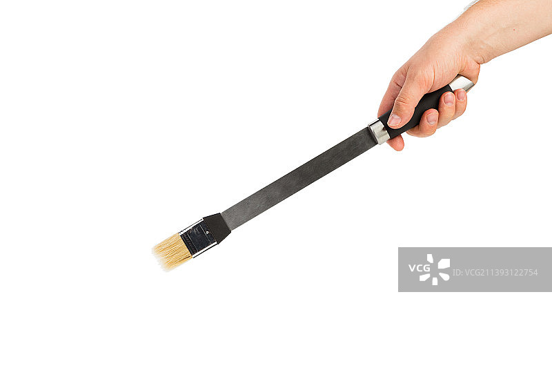 手持涂油刷，摩尔多瓦图片素材