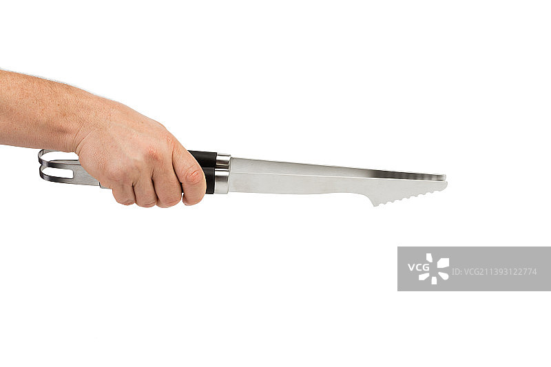 手持厨房用具钳子，摩尔多瓦图片素材