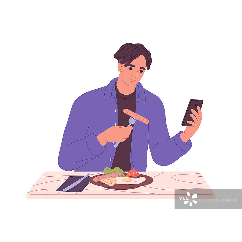 男人用手机吃英式早餐图片素材