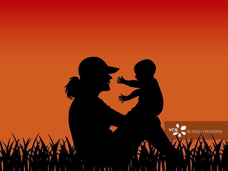 日落背景下的女子和孩子剪影图片素材