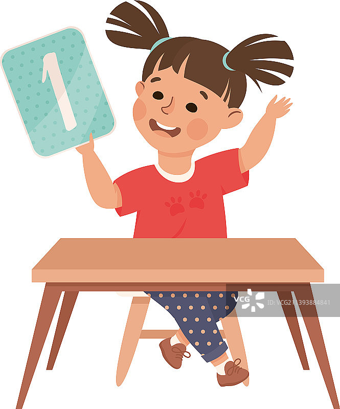 小女孩坐在书桌前图片素材