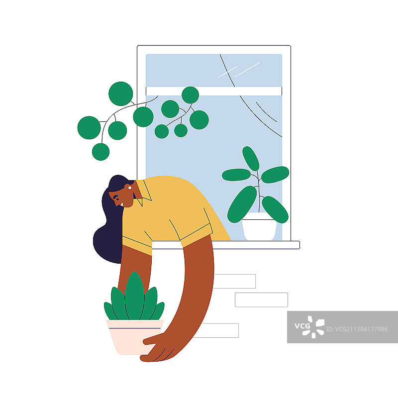 在敞开的窗户边装饰墙壁的快乐女人图片素材