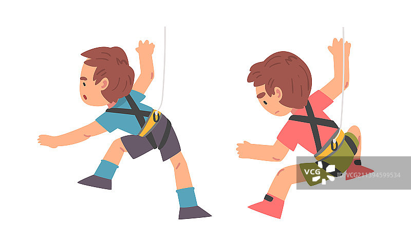 小男孩攀登陡峭的岩石或墙壁图片素材