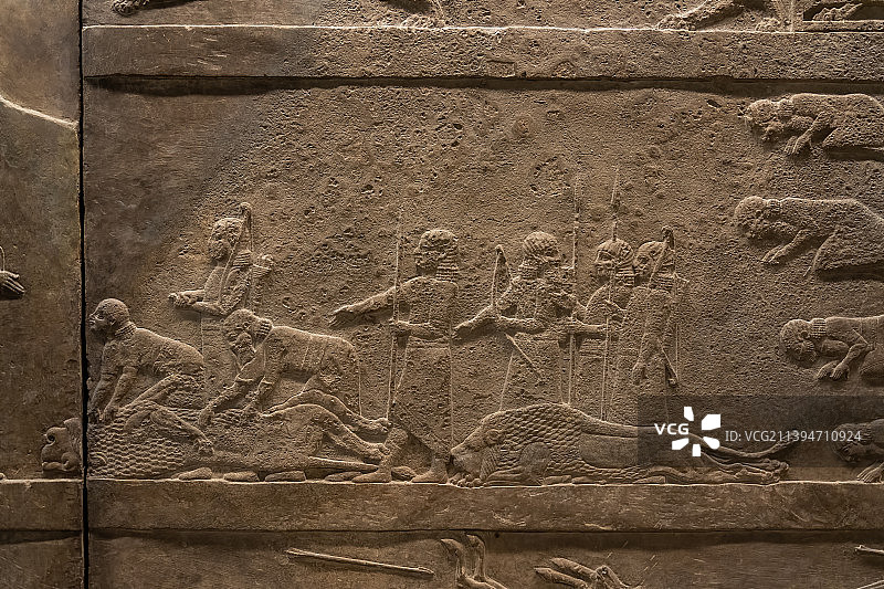 大英博物馆亚述王国尼尼微亚述巴尼拔王宫猎狮浮雕图片素材