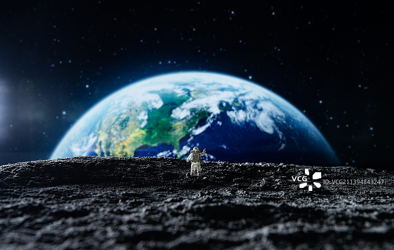 宇航员看向地球图片素材