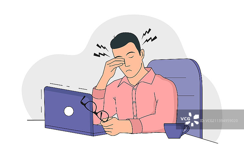 疲惫的年轻男子使用笔记本电脑工作图片素材
