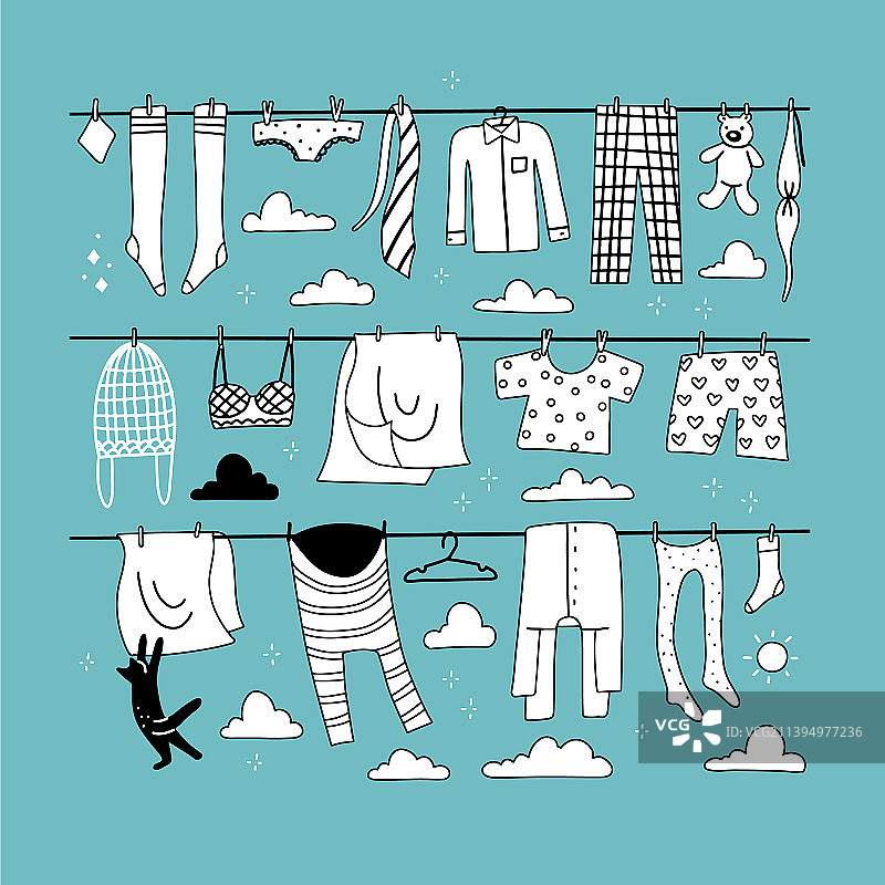 晾衣绳上悬挂的纯色衣物图片素材