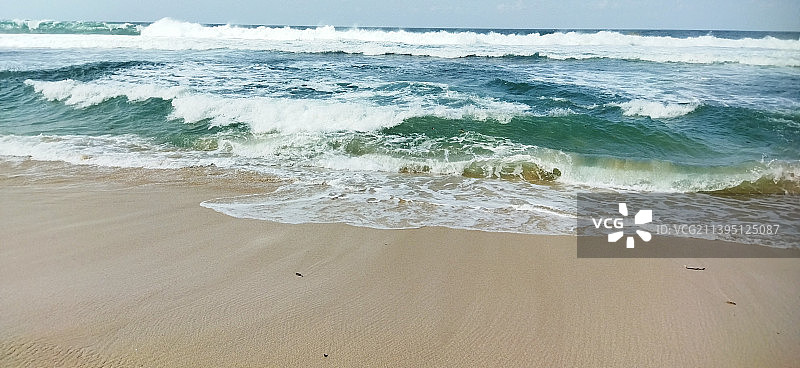 海滩对着天空的景色图片素材