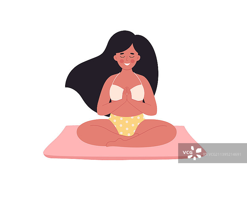 在瑜伽垫上冥想的女人图片素材