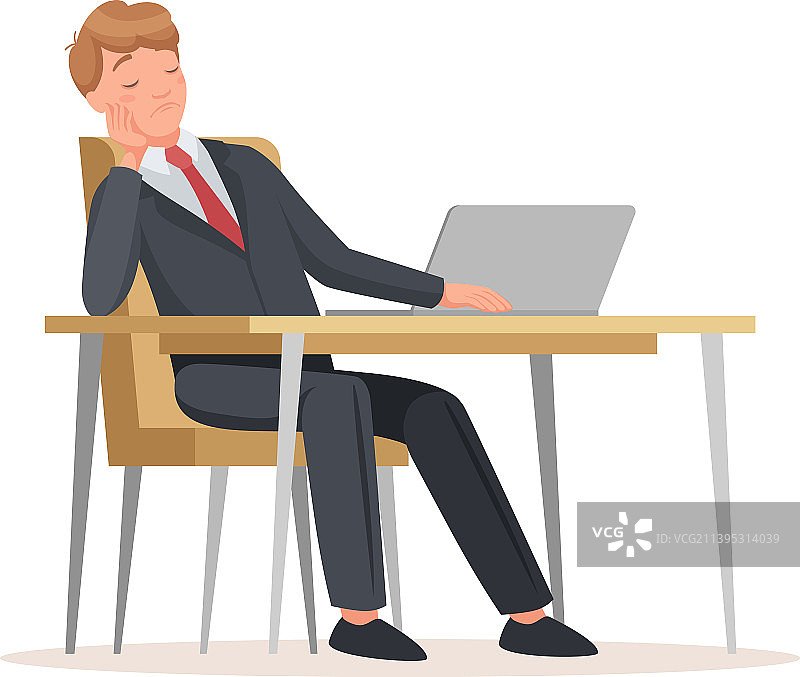 坐在办公桌前使用笔记本电脑的男人图片素材