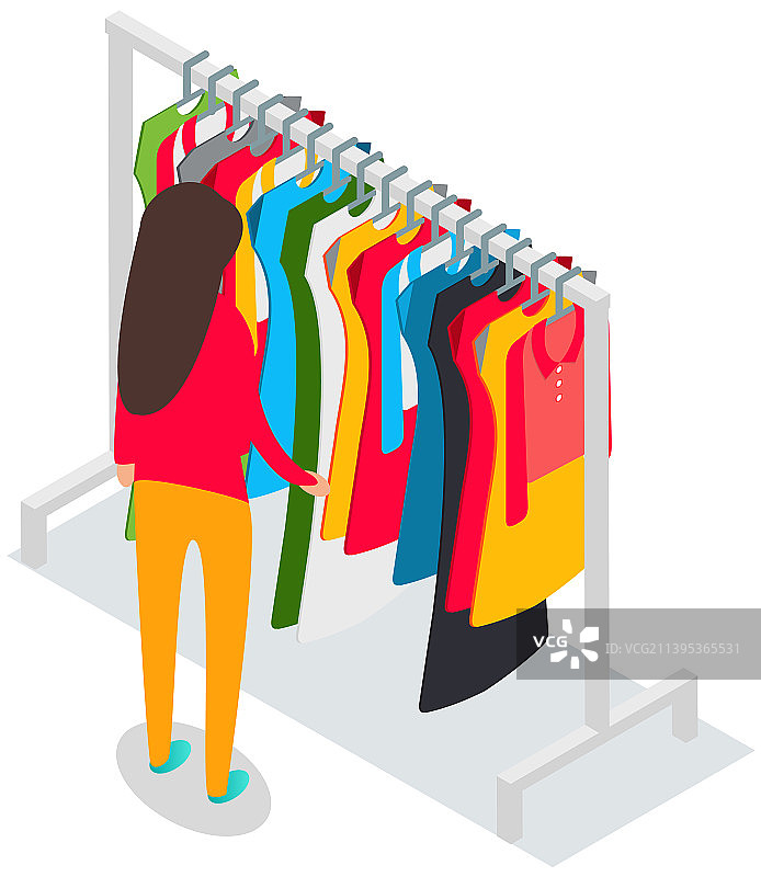 站在衣架前挑选衣服的女人图片素材