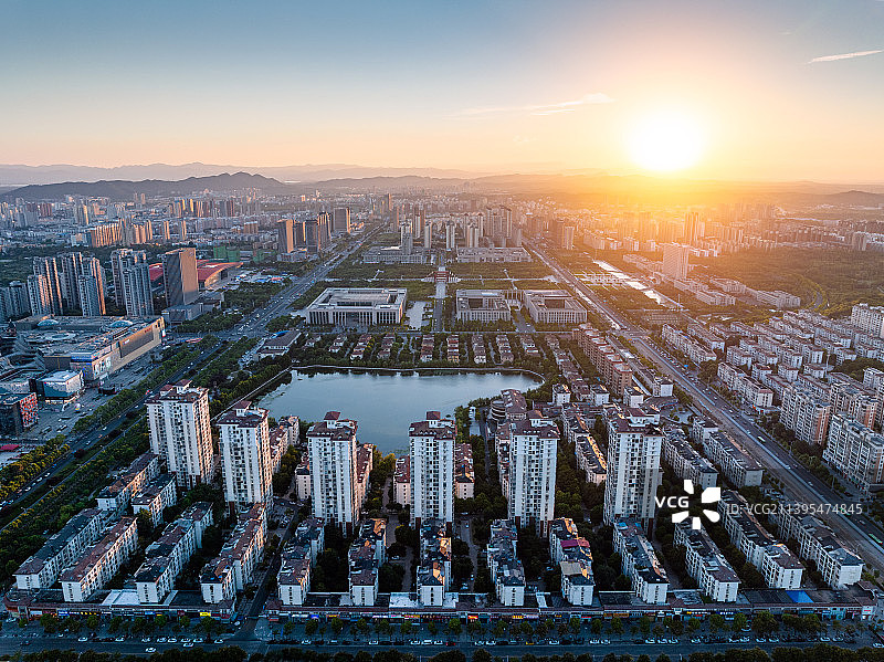 河南信阳羊山新区城市天际线日落风光航拍俯瞰图片素材