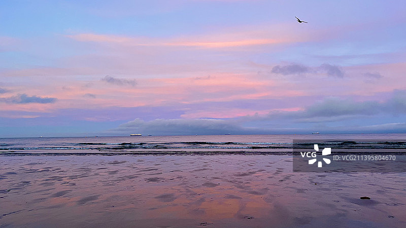 日落时分英国尚克林海滩的壮丽景色图片素材