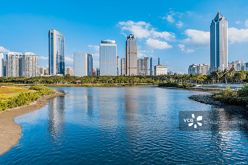 中国海南海口万绿园和国贸CBD建筑群晴天风光图片素材