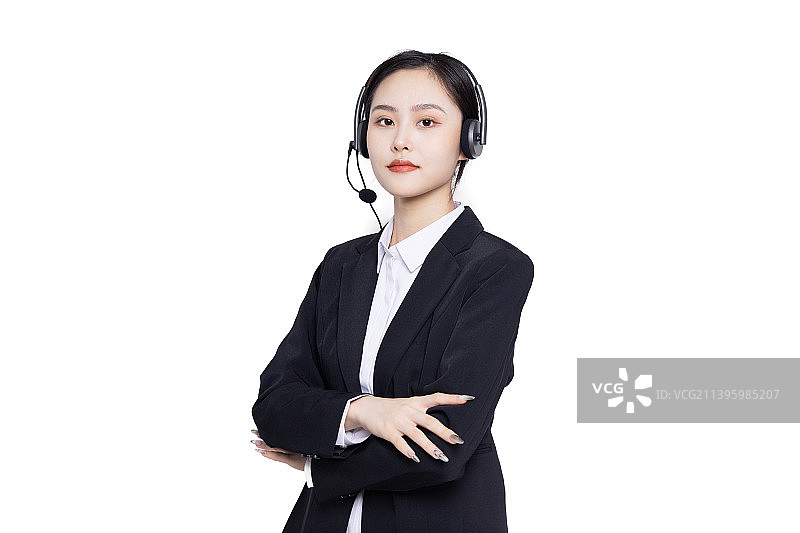 戴着耳麦工作的年轻女性客服图片素材