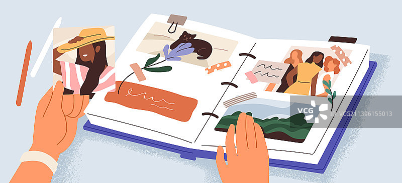 双手制作带有回忆的相册纸质书图片素材