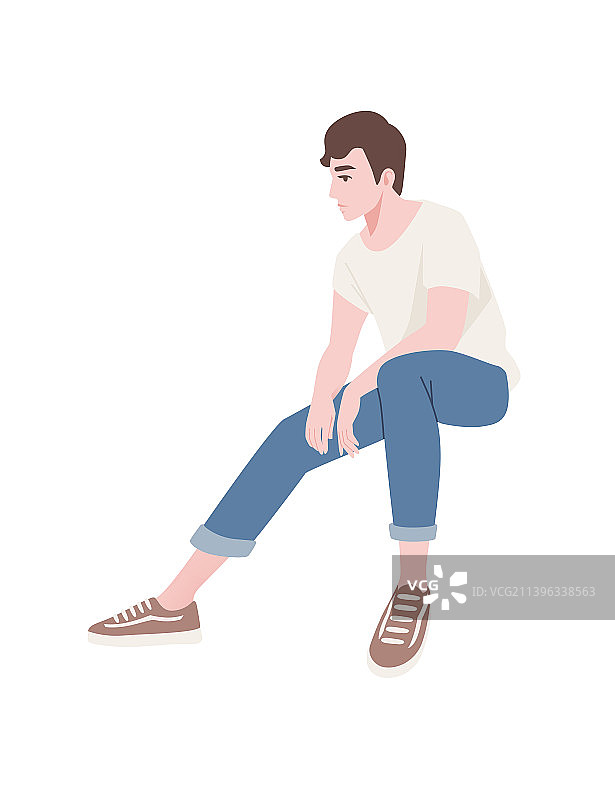 坐姿的可爱休闲年轻男子图片素材