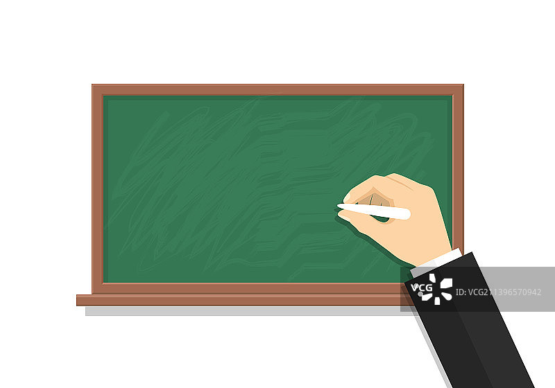 手拿粉笔在黑板上书写图片素材