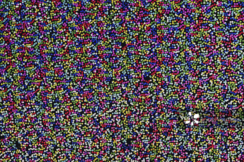 德国黑色织物背景上的彩色亮片纹理图片素材