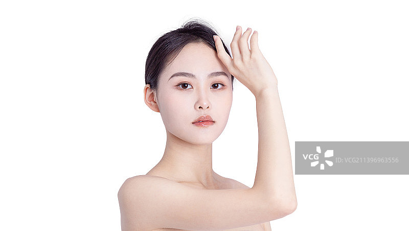 白色背景下年轻女子的特写肖像图片素材