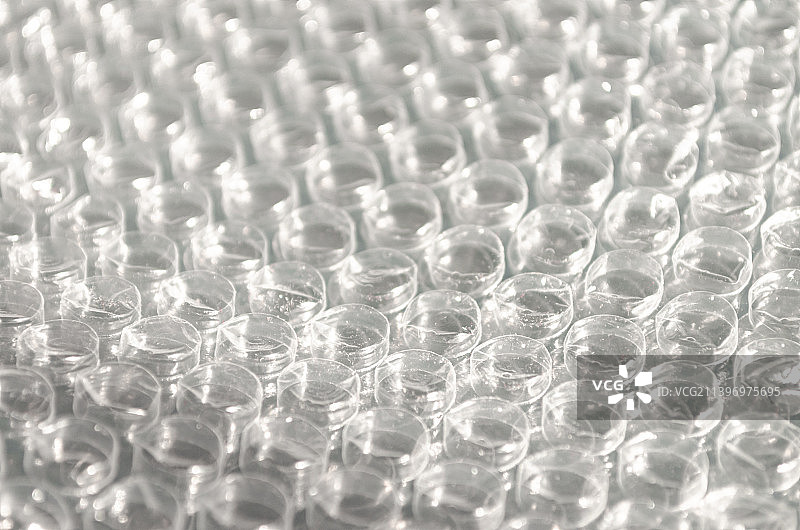 中国产品包装拍摄主题，透明的泡沫垫，室内无人影棚拍摄图片素材