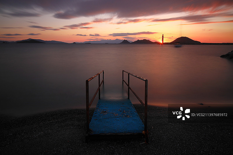 图尔古特雷斯海滨小镇的日落，土耳其长曝光美景图片素材