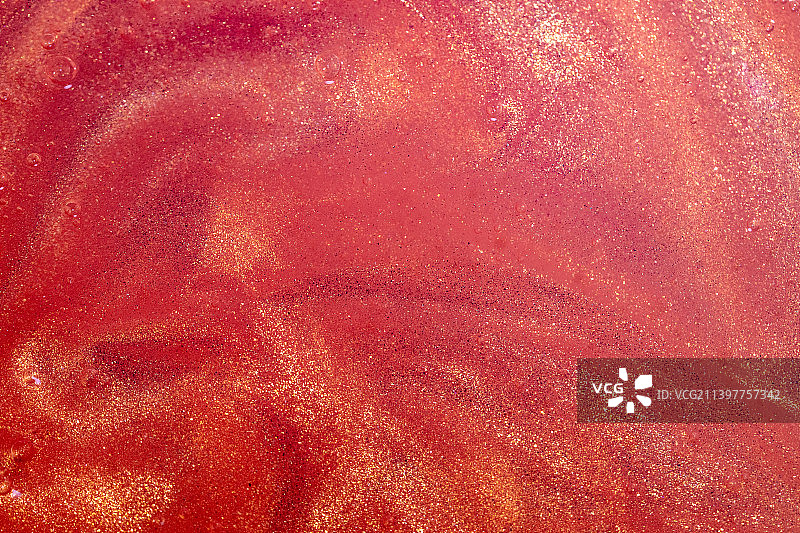红色金粉液态流体微距背景图片素材