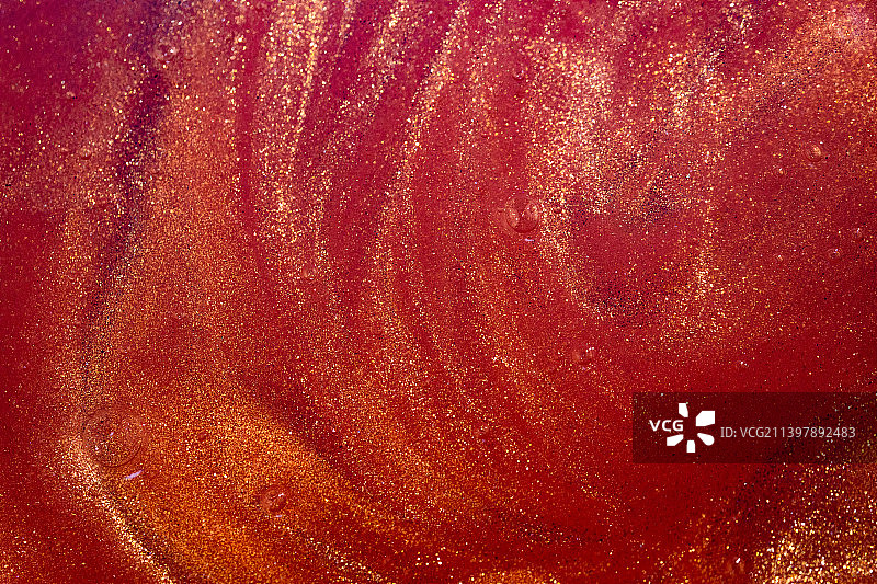 红色金粉液态流体微距背景图片素材