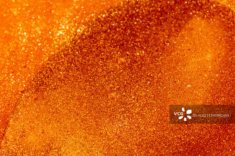 红色金粉液态流体微距背景图片素材