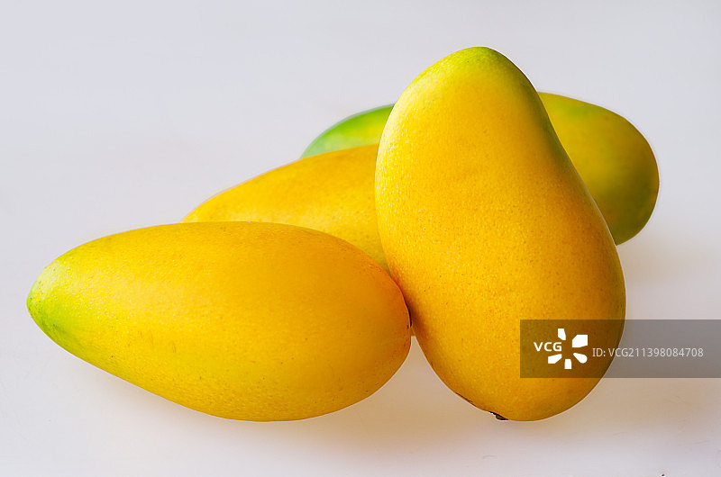 堆叠在一起的芒果图片素材
