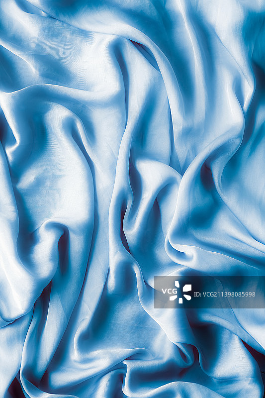 蓝色褶皱布料特写画面图片素材