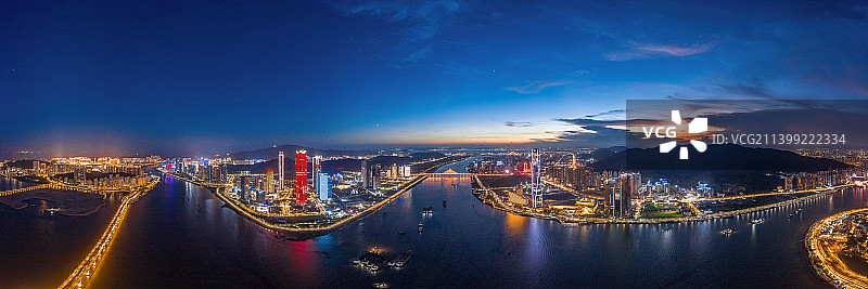 航拍珠海十字门中央商务区和澳门半岛全景夜景图片素材