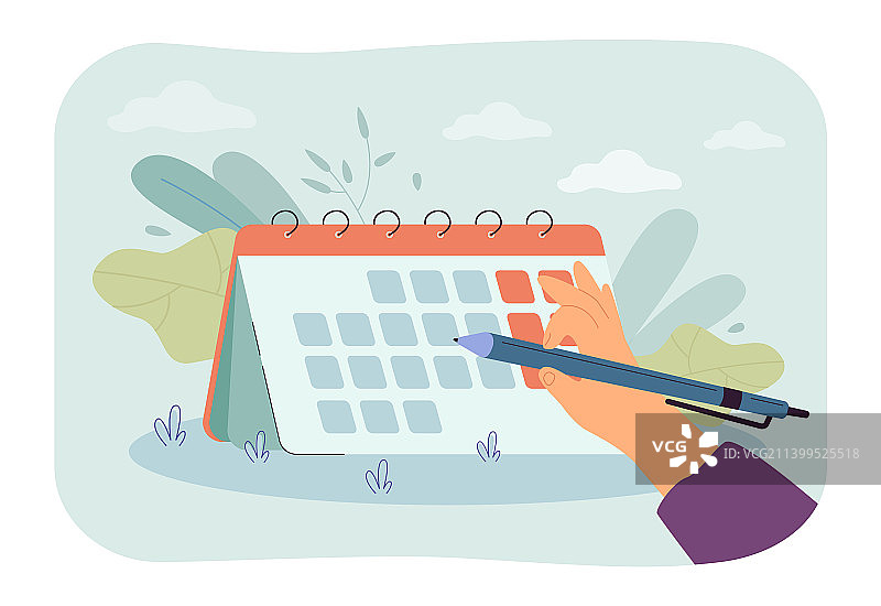 手持笔在日历上标记日期图片素材