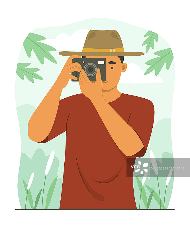 专注拍摄照片的男人图片素材