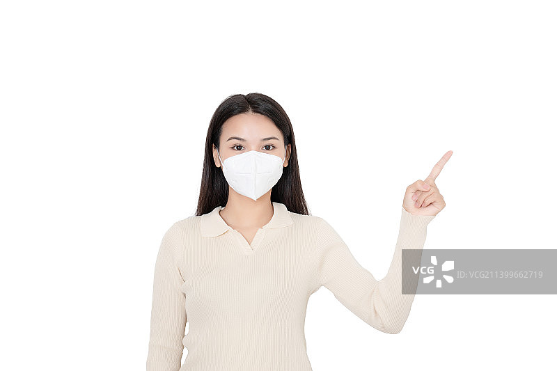 白色背景前一个戴口罩的年轻女性图片素材