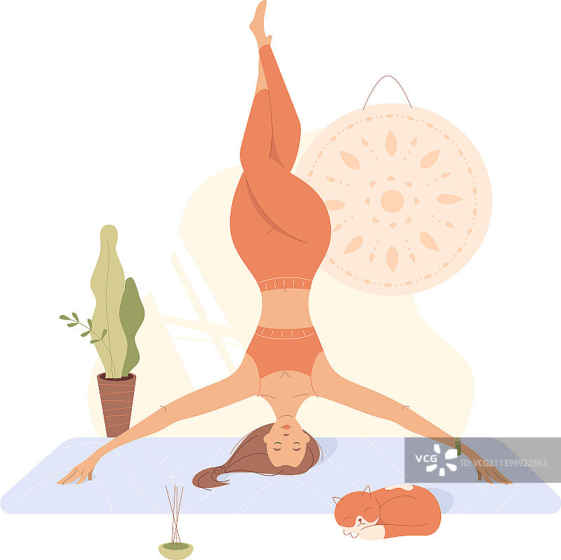 女人在家练习瑜伽头倒立图片素材