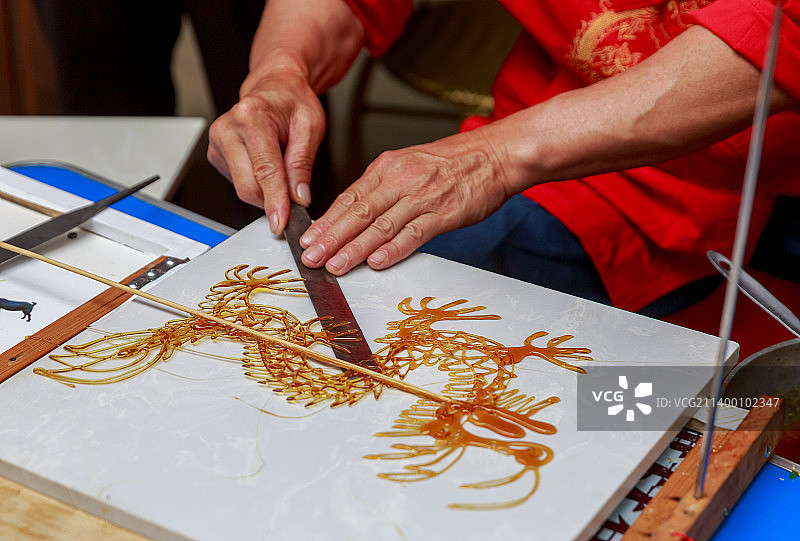 非遗文化项目糖画制作工手艺图片素材