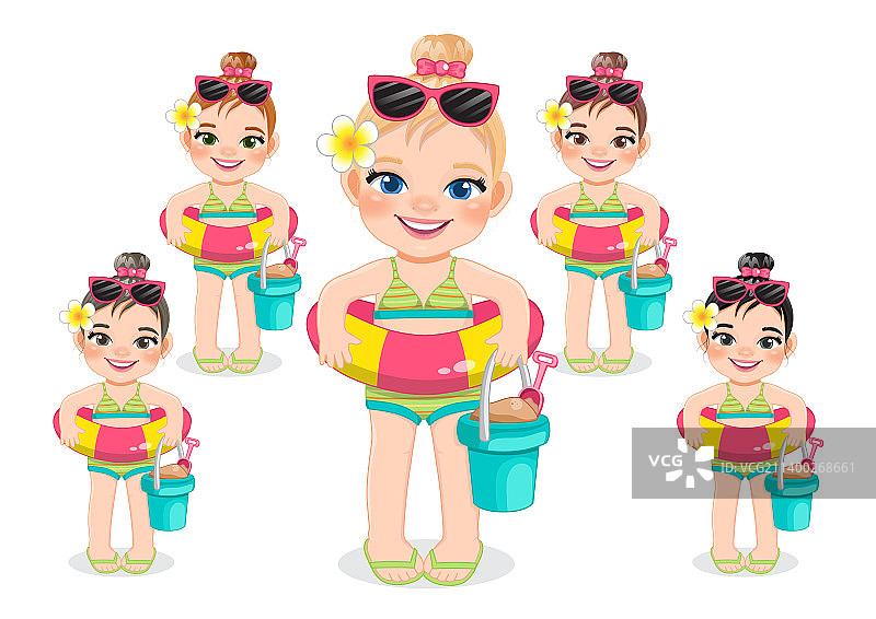 夏季假日里拿着橡皮玩具的沙滩女孩图片素材