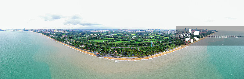 航拍海南海口假日海滩旅游景区全景图 椰树沙滩图片素材
